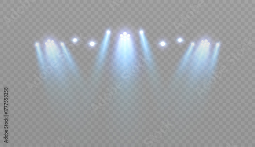 A series of blue stage spotlights with soft beams and glow on a transparent background. Lighting effect for concerts and events, advertising scenes, and user interface overlays.
