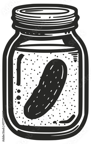 Pickled cucumber in a jar with brine and a lid