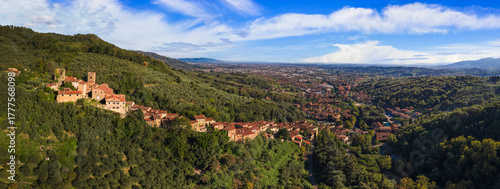 Tableau sur toile Aerial Panorama of Collodi: Iconic Vertical Medieval Village famous for hisBaroque Gardens of Villa Garzoni and Pinoccio park