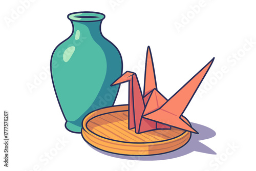 Teal ceramic vase next to traditional orange paper origami crane on wooden base