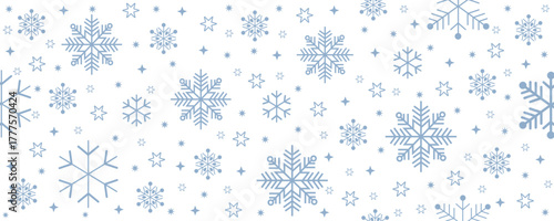 Seamless winter pattern featuring blue snowflakes on a white background. Minimalist festive design ideal for Christmas wrapping paper, holiday cards, textiles, and seasonal decorations.