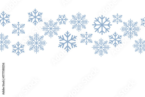 Seamless winter pattern featuring blue snowflakes on a white background. Minimalist festive design ideal for Christmas wrapping paper, holiday cards, textiles, and seasonal decorations.