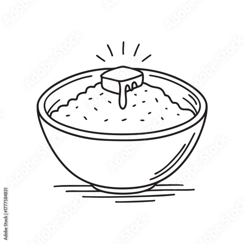 Bowl of hearty grain porridge completed with melted butter