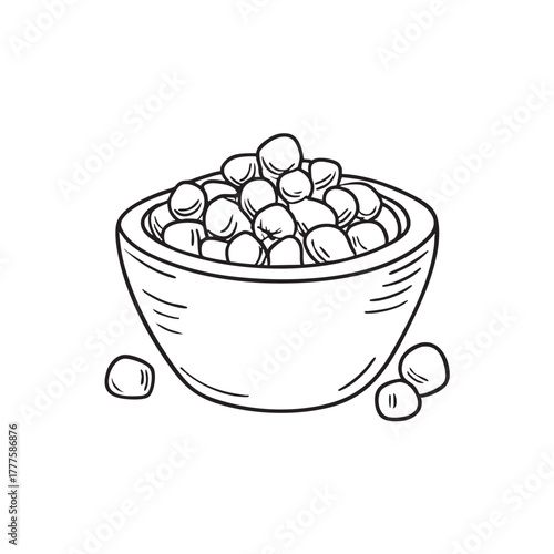 Small clay bowl serving roasted seasoned chickpeas