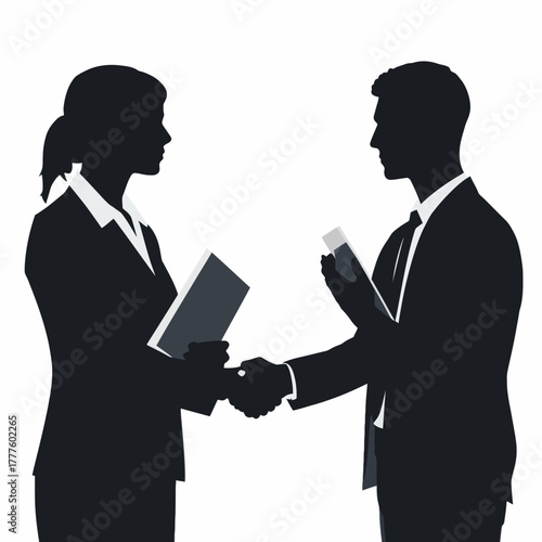 Silhouette of a businessman and businesswoman shaking hands, symbolizing a professional agreement or successful partnership