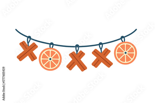Holiday garland decoration with dried orange slices and crossed cinnamon sticks hanging on a string