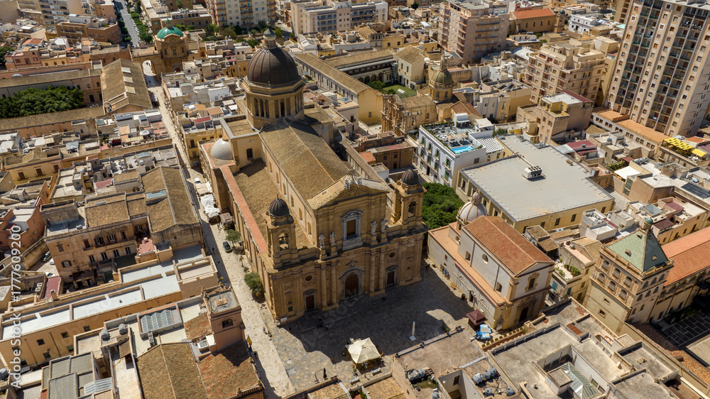 Fototapeta premium Aerial view of Marsala Cathedral, in province of Trapani, Sicily, Italy. It's the largest church in the town and has a Baroque style facade. It is dedicated to the Anglo-Norman saint Thomas Becket.
