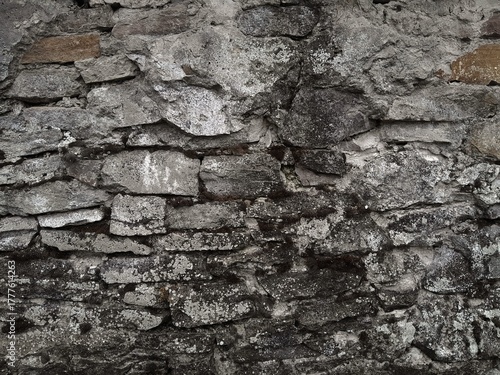 Background of very old stone wall texture photo