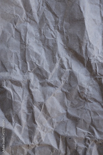 Brown crumpled recycled paper texture background. Kraft Paper