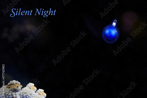 Silent Night Blue Christmas ball Glow and nosy sheep
Peaceful stars shine above glowing blue Christmas ornament.
