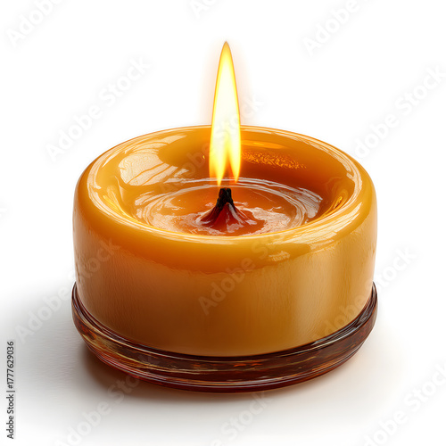 Warm candle flame glowing in a glass holder at night