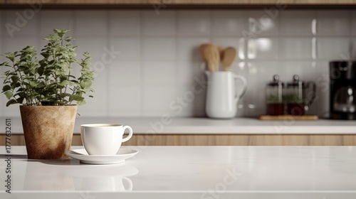 Wallpaper Mural A serene kitchen scene featuring a potted plant, a coffee cup on a saucer, and kitchen utensils, creating a cozy and inviting atmosphere. Torontodigital.ca