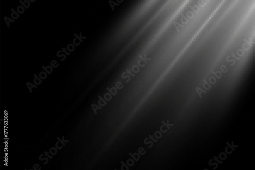 Abstract glowing rays of light on black background. 