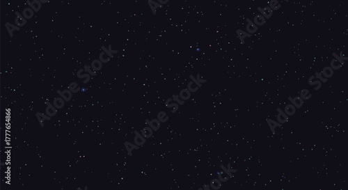 A vast, dark expanse of night sky filled with countless stars. Some appear as tiny pinpricks, while others glow with subtle color