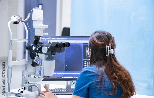 A doctor conducts a vision diagnosis using modern ophthalmological equipment in the doctor's office. Diagnosis of eye diseases.