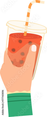 Hand holding boba tea drink with straw