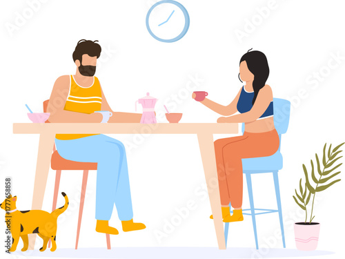 Couple enjoying morning coffee and breakfast with cat