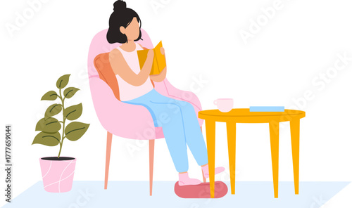Woman reading book relaxing in cozy armchair at home
