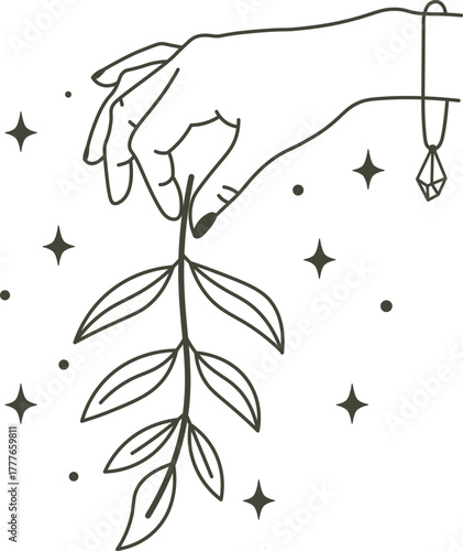 Hand holding celestial plant twig with crystal necklace