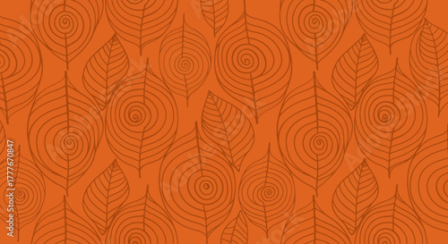 Autumnal orange background pattern of spiraled and veined leaves
