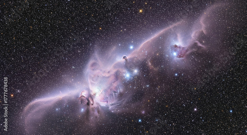 Celestial Stallions: Cold Dust Clouds Under Star's Light.
An extraordinary, high-resolution astronomical image of a vast reflection nebula extending horizontally across the dark canvas of space