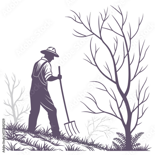 Silhouette of a farmer working the land with a pitchfork near bare trees