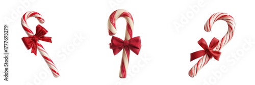 Three Candy Canes with Red Bows isolated on a transparent background