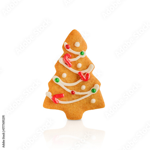 Christmas Gingerbread cookie in fir tree shape isolated on white background with clipping path. Christmas card design element.