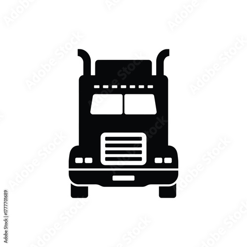 Black semi truck viewed from the front