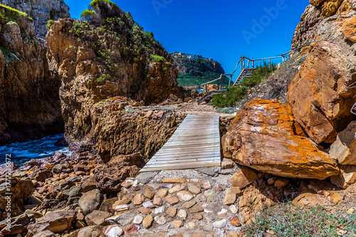 A view of the path on the rocky shoreline on the West Head headland, South Africa in Springtime