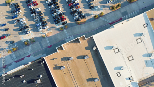 Bild auf Leinwand Flat roof coated in light and dark asphalt at Lewisville, Texas retail shop with