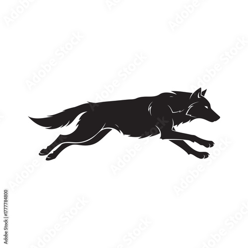 Dynamic black wolf silhouette in powerful mid stride captures wild spirit and untamed freedom
