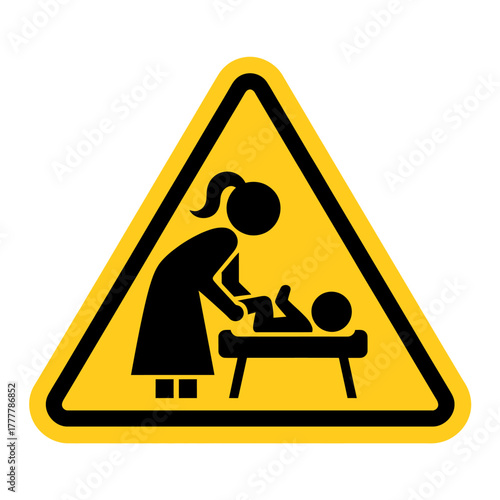 Warning sign for changing station facility depicting a mother and baby in black on yellow background