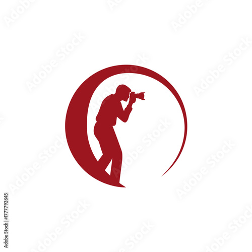 Red silhouette of a photographer holding a camera within a circular arc graphic icon, perfect for creative photography business logos or concepts.