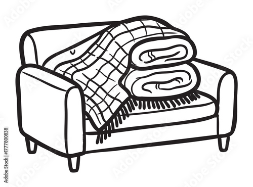 Black outline vector drawing of a cushioned armchair with a neatly folded plaid blanket on its seat.