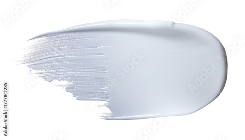 A cosmetic cream, lotion, or paint smear swatch with a rich texture. Isolated on transparent background. Swipe of white paint with visible brush strokes showing texture.
