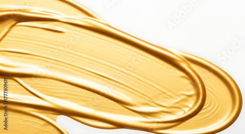 Vector illustration of abstract golden paint stroke, a thick, glossy smear of metallic gold color on a white background, showcasing texture and movement
