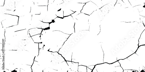 A Cracked black surface texture with irregular patterns, resembling dried earth or fractured material