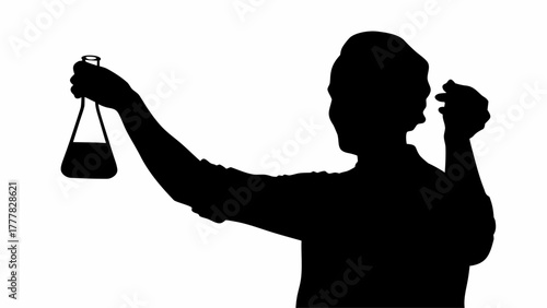 Silhouette of a scientist holding a flask with liquid during an experiment in the laboratory setup