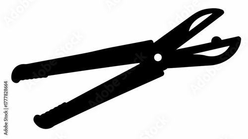 Silhouette of open metal shears with curved blades and textured handles on a white background view
