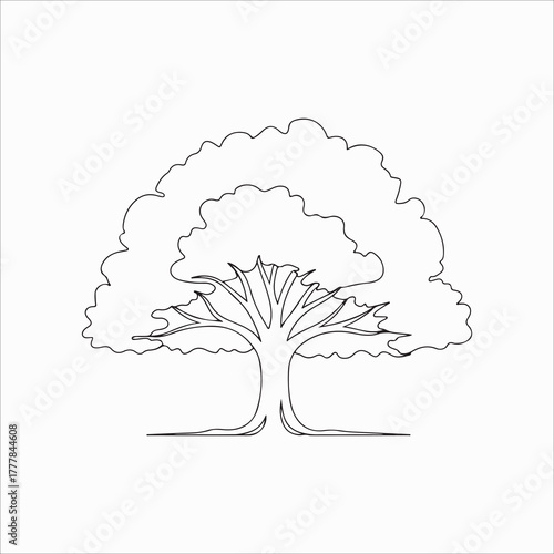 A majestic oak tree stands tall, its branches reaching towards the sky, a symbol of strength and resilience