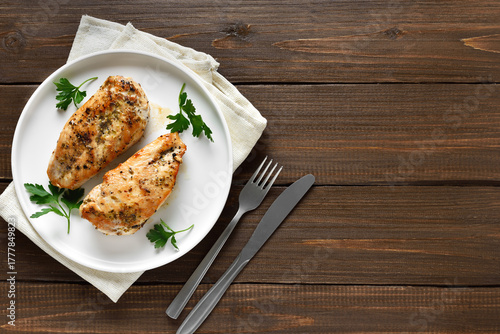 Roasted chicken breast on plate