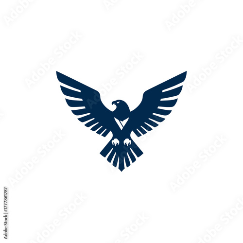 Majestic stylized dark blue eagle soaring with spread wings. Graphic bird of prey symbol representing freedom, power, and strength.