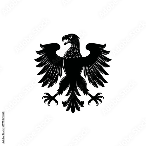 Powerful black eagle silhouette, majestic heraldic emblem. Stylized graphic of a regal bird of prey, symbol of freedom and strength.