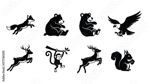 Set of wild animals including fox, bear, monkey, eagle, deer, and squirrel in black and white stylized vector icons isolated on white background
