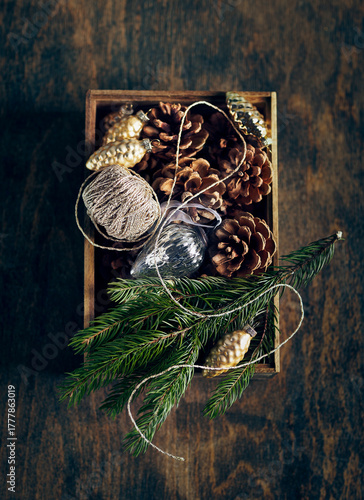 Rustic Christmas Decorations on old wooden background. Top view