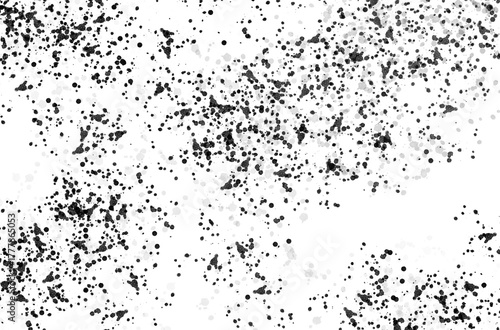 Abstract Ink Splatter Texture with Varied Density and Subtle Gray Halftones.