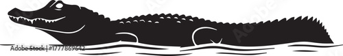 Dark silhouette of an alligator swimming in water wildlife scene