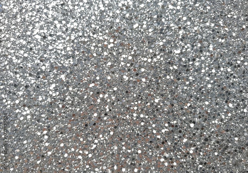 Fototapeta premium Silver glitter texture creating a sparkling and festive background, ideal for celebrations, holidays, and design projects