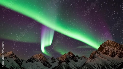 Majestic green and purple aurora borealis dancing above snow-capped mountains under a starry night sky breathtaking natural